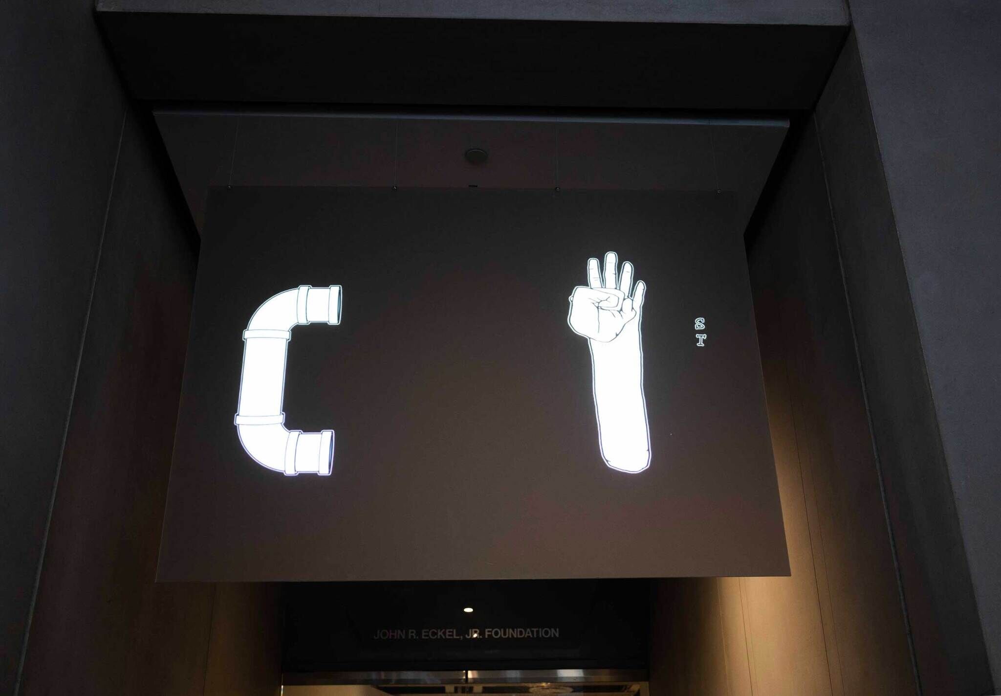 Illustration of a pipe forming a "C" and a hand making an "OK" sign, resembling the word "COST" on a dark background.