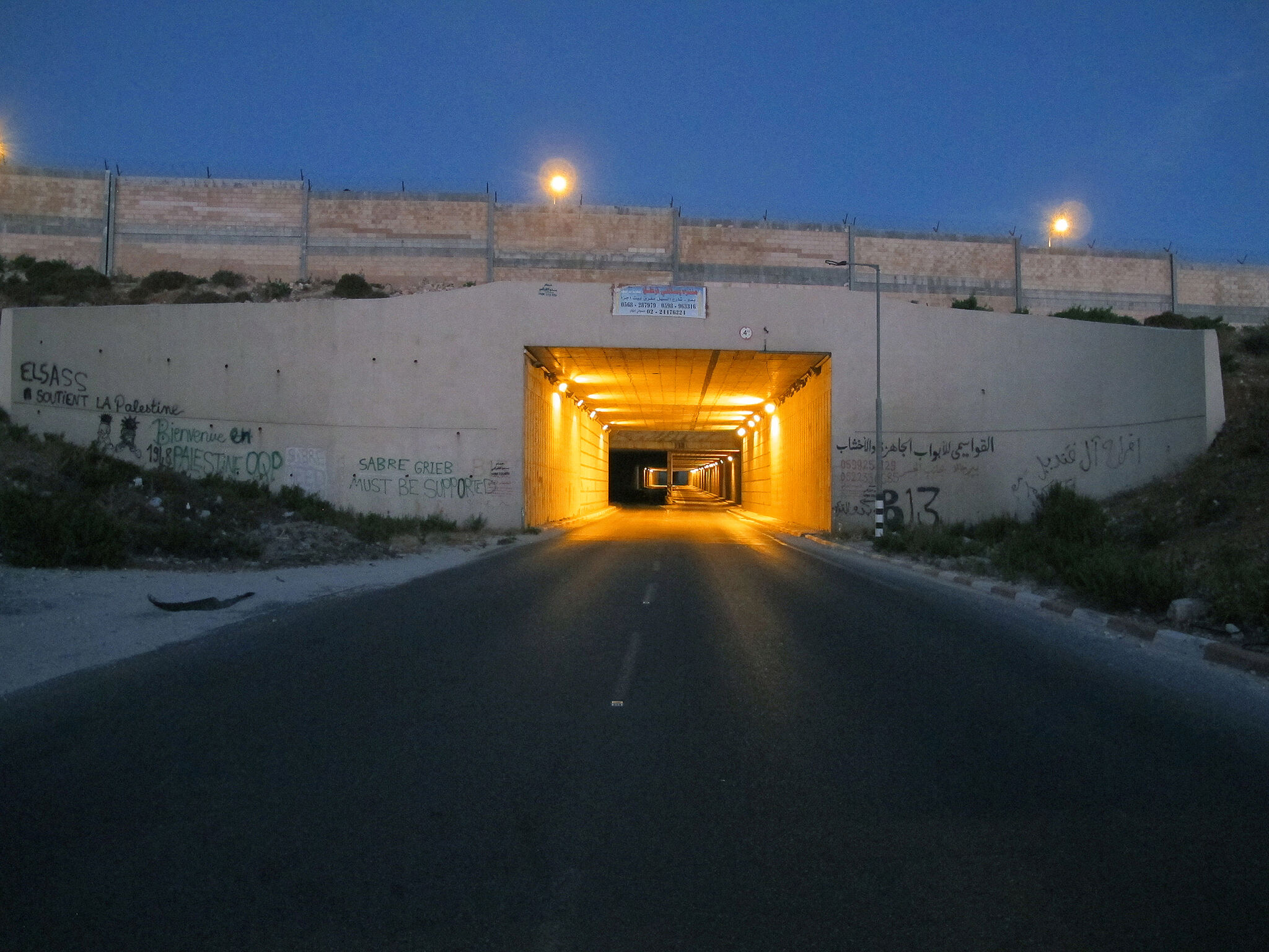 Tunnel at night with light.