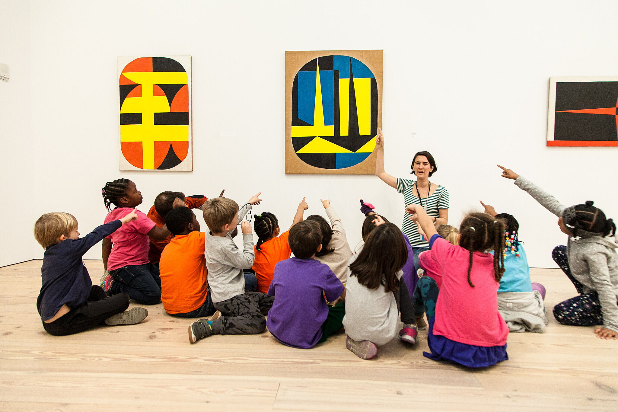 Kids sitting in the galleries.